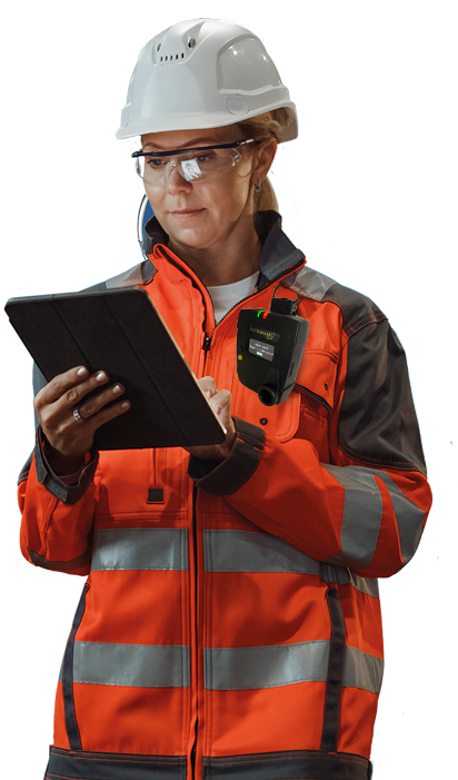 DustCanary Trend 420 being worn by a woman in an industrial setting with a clipboard