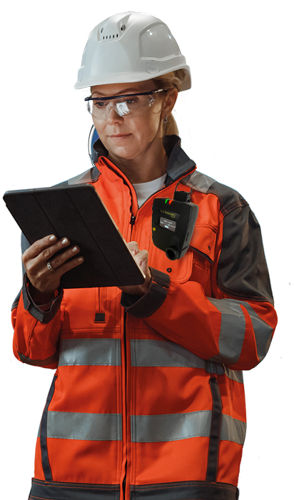 DustCanary Trend 420 being worn by a woman in an industrial setting with a clipboard